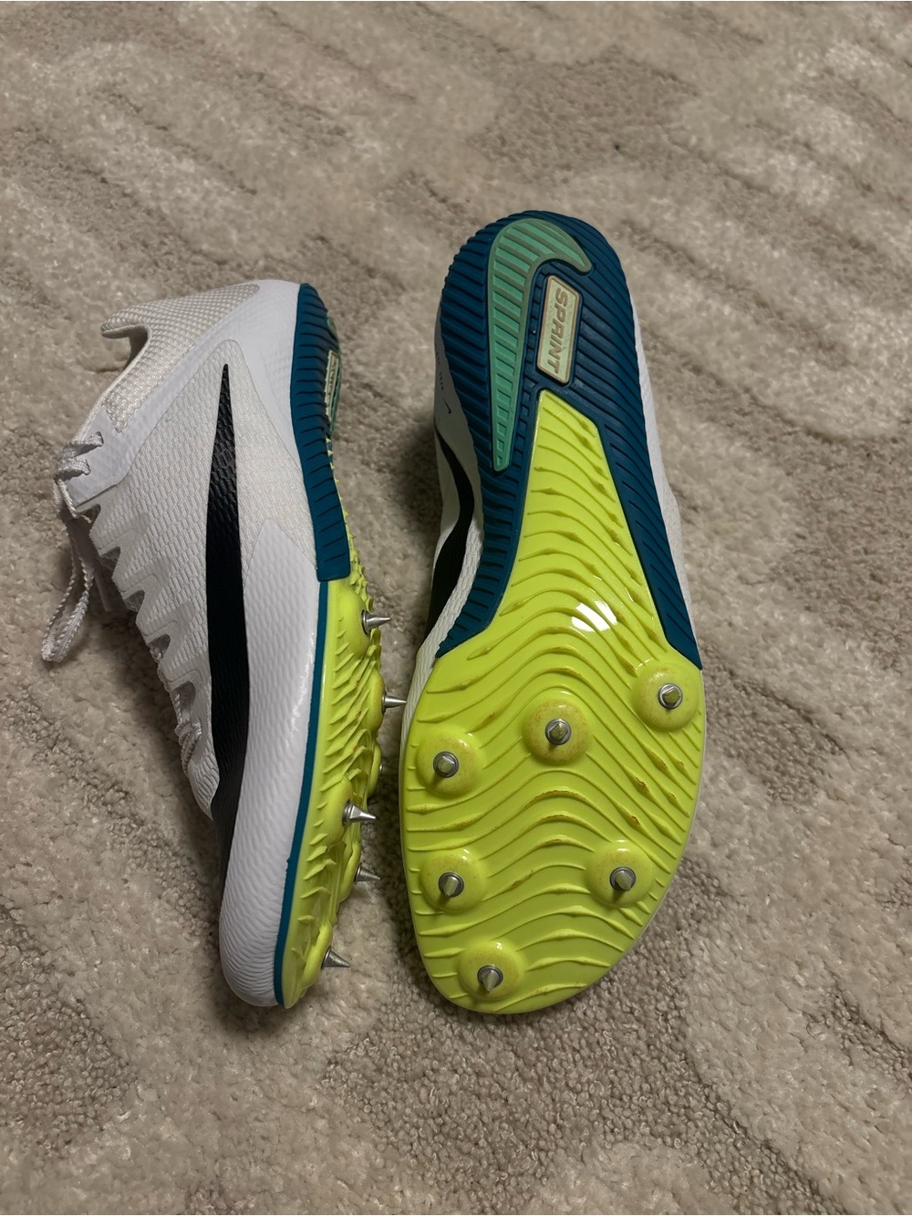 Nike Men’s White Athletic Shoes with Black Swoosh